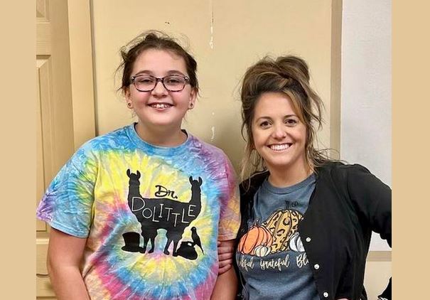 Sophie getting her braces on