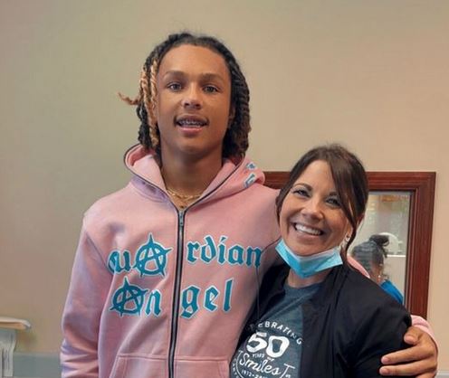 Joshua is beaming with joy after having his braces put on!